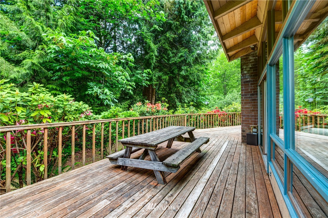 1309 Old Samish Road Bellingham, WA 98229 - Photo 24 of 40 a view of a wooden deck with a bench