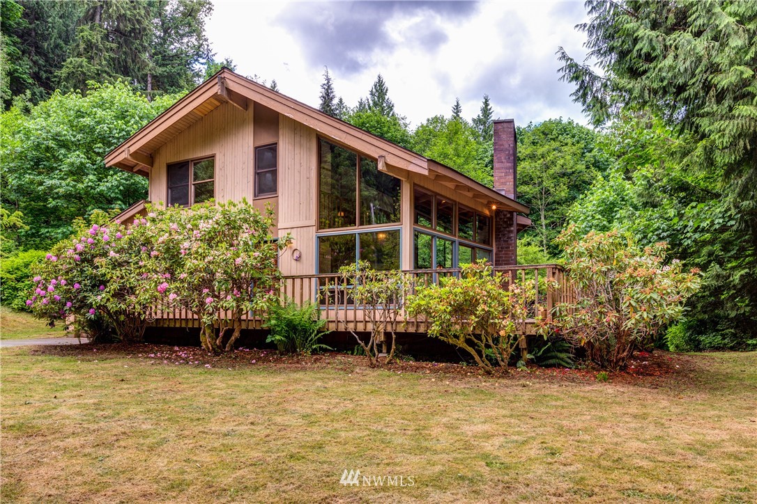 1309 Old Samish Road Bellingham, WA 98229 - Photo 28 of 40 a house is sitting in middle of garden
