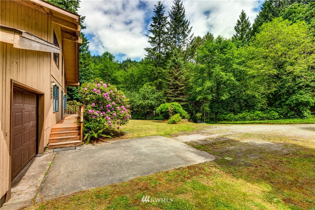 1309 Old Samish Road Bellingham, WA 98229 - Photo 31 of 40 a view of a house with backyard and garden