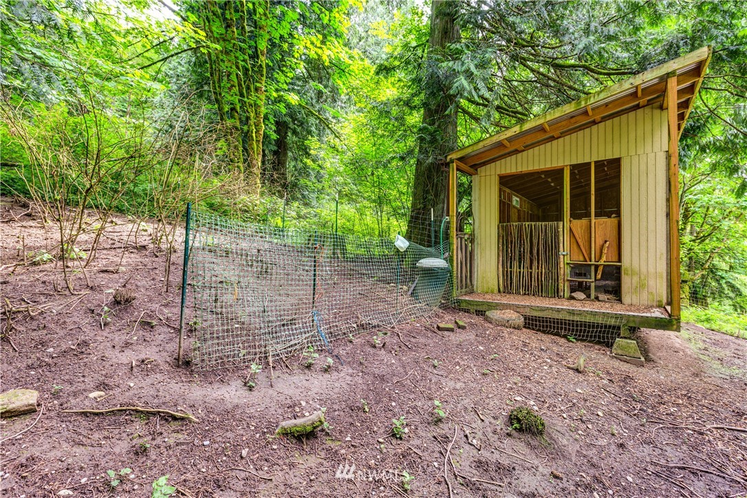 1309 Old Samish Road Bellingham, WA 98229 - Photo 40 of 40 a view of a house with a backyard