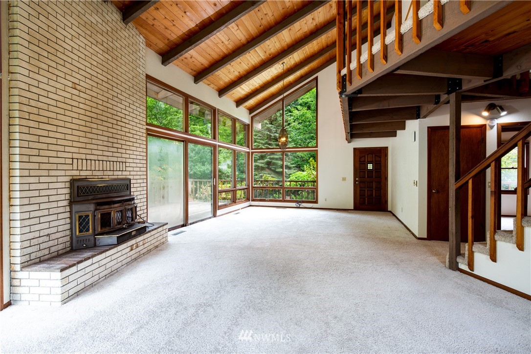 1309 Old Samish Road Bellingham, WA 98229 - Photo 6 of 40 a view of an empty room with a fireplace