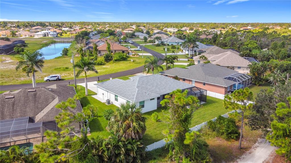 26 Medalist Way Rotonda West, FL 33947 - Photo 55 of 63 an aerial view of a house with a garden