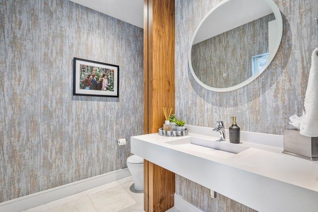 a view of a swimming pool with a yard