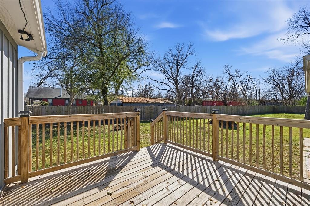 3801 South 4th Street Waco, TX 76706 - Photo 21 of 26 a view of a wooden roof deck