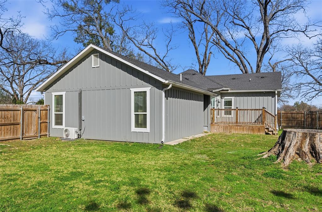 3801 South 4th Street Waco, TX 76706 - Photo 22 of 26 a front view of house with yard and green space