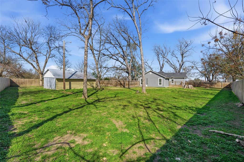 3801 South 4th Street Waco, TX 76706 - Photo 24 of 26 a view of a house with a yard