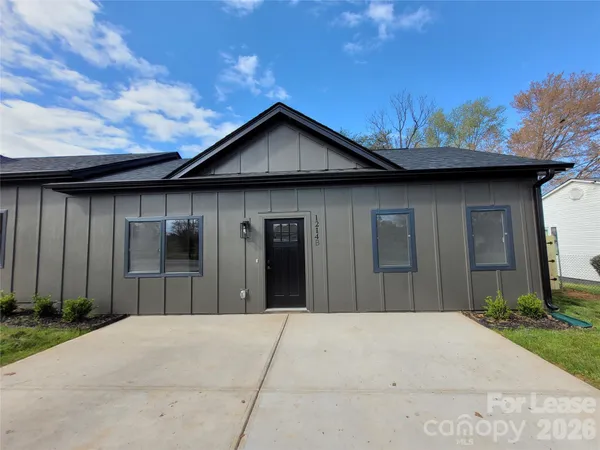 a house view with a backyard space