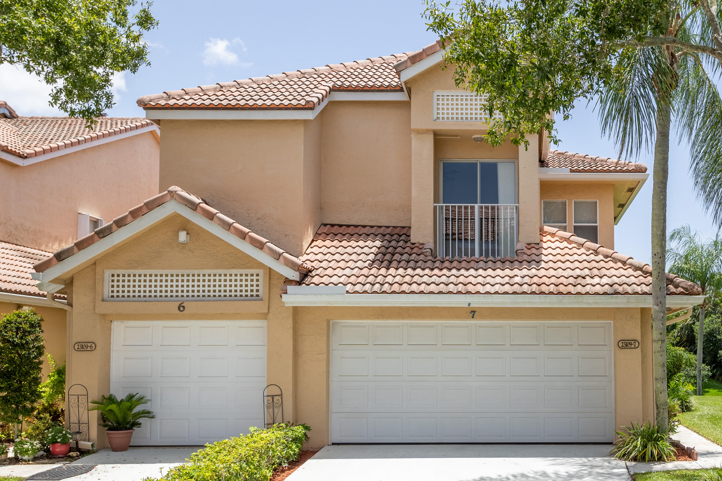 23109 Aqua View, Unit 7 Boca Raton, FL 33433 - Photo 25 of 34 Two Car Garage & Side Entrance