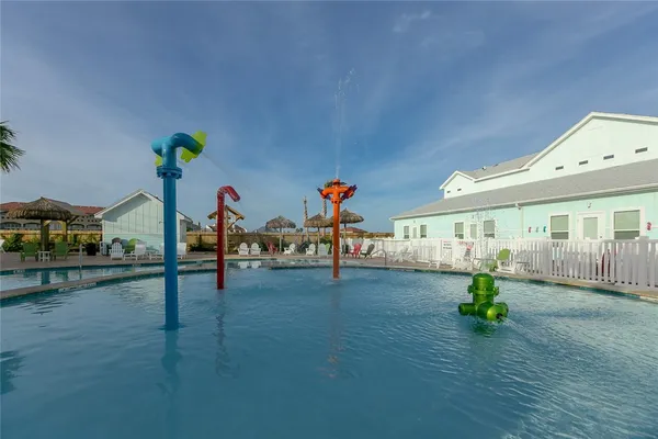 a view of a house with swimming pool