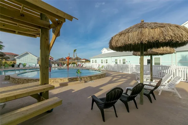 a view of yard with patio