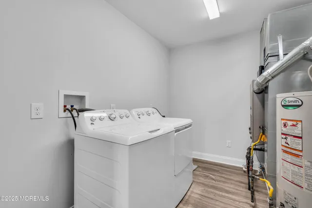 an aerial view of a house with a lake view