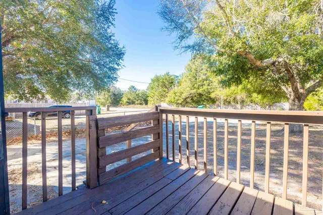 a view of a wooden balcony