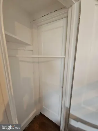 a view of entryway and kitchen