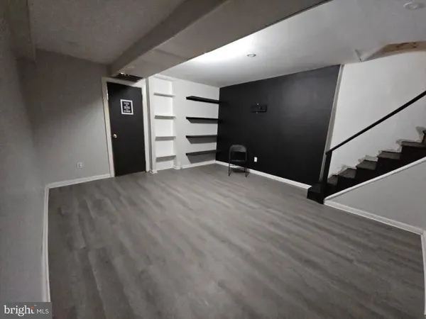 a view of a street with a parked cars