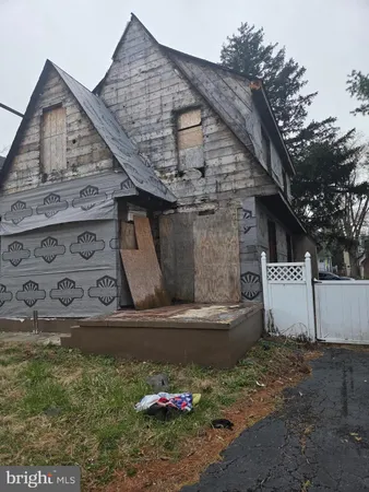 a front view of a house with garage