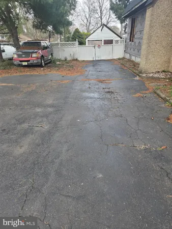 a view of street with parked cars