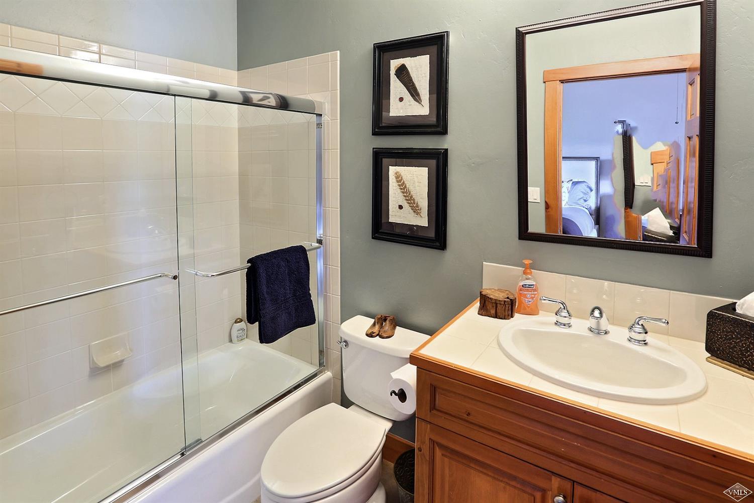 179 Knudson Ranch Road Edwards, CO 81632 - Photo 12 of 21 a bathroom with a sink toilet and shower