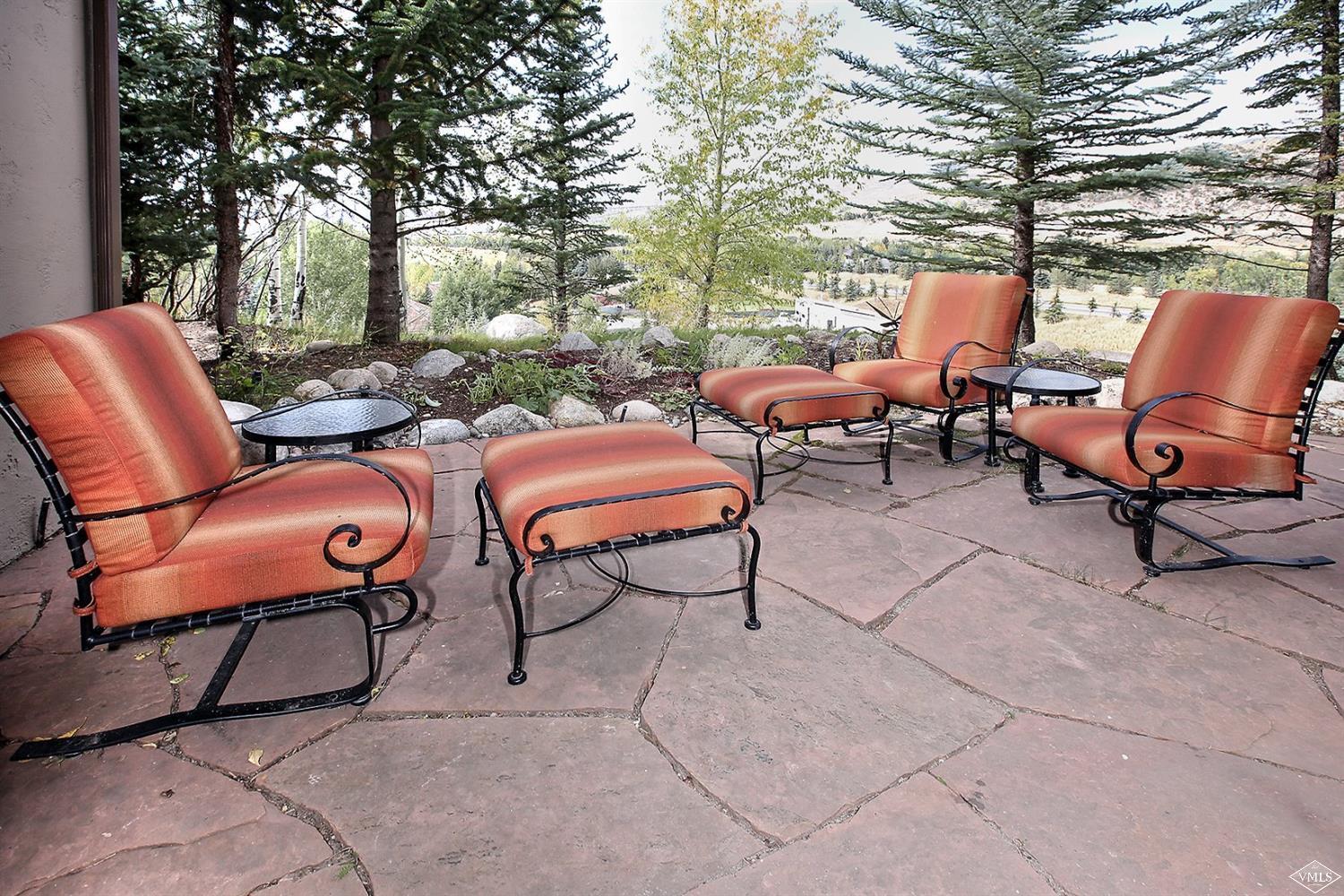 179 Knudson Ranch Road Edwards, CO 81632 - Photo 19 of 21 a group of chairs sitting in backyard of house