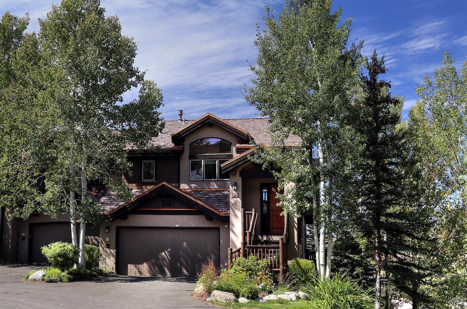 179 Knudson Ranch Road Edwards, CO 81632 - Photo 7 of 21 a front view of a house with a yard