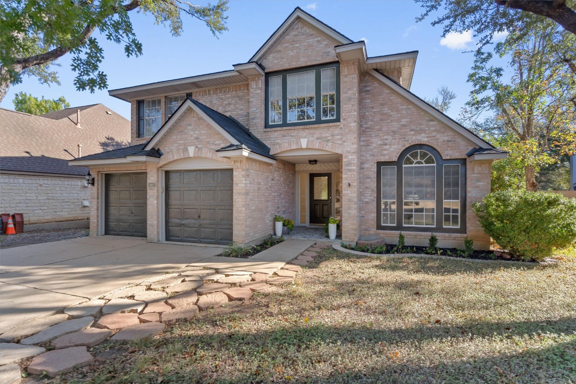 2602 Rainfall Trail Cedar Park, TX 78613 - Photo 1 of 36 a view of a house with a yard