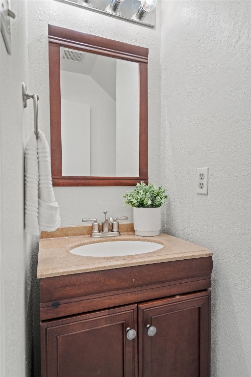 2602 Rainfall Trail Cedar Park, TX 78613 - Photo 19 of 36 a bathroom with a sink and a mirror