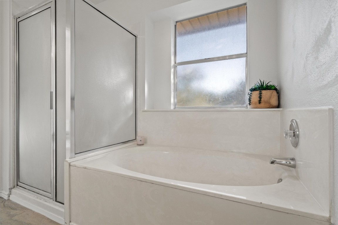 2602 Rainfall Trail Cedar Park, TX 78613 - Photo 27 of 36 a white bath tub sitting next to a window