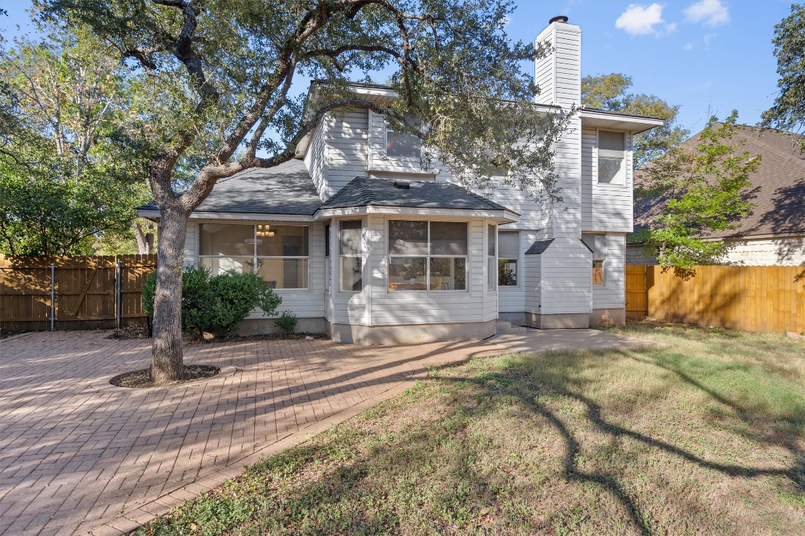 2602 Rainfall Trail Cedar Park, TX 78613 - Photo 31 of 36 a front view of a house with yard and trees