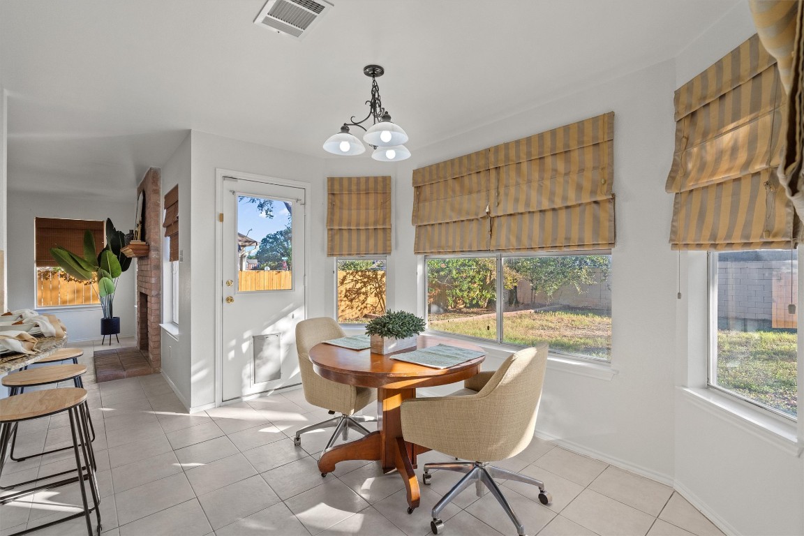 2602 Rainfall Trail Cedar Park, TX 78613 - Photo 9 of 36 a view of a dining room with furniture window and outside view