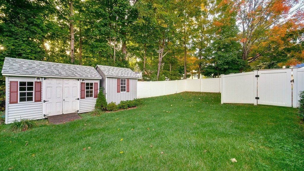 986 Allen Street Springfield, MA 01118 - Photo 26 of 30 a view of a backyard with a garden