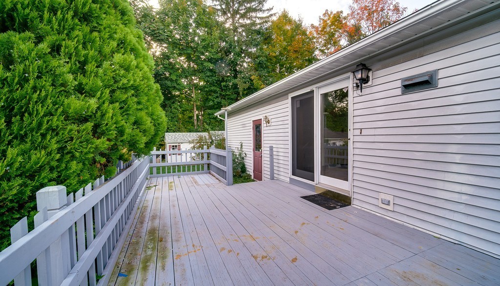 986 Allen Street Springfield, MA 01118 - Photo 28 of 30 a view of backyard with a deck and wooden floor