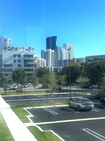 a view of a room with a large window