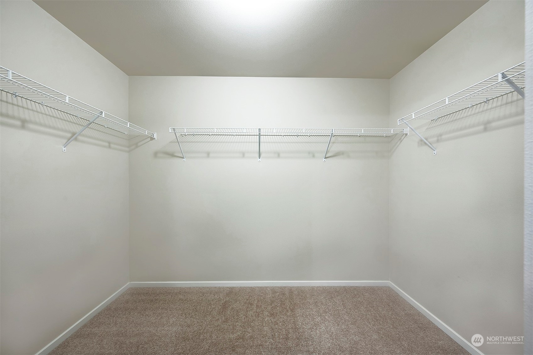 12329 23rd Drive Southeast, Unit 10 Everett, WA 98208 - Photo 15 of 24 a view of a room with racks on the wall