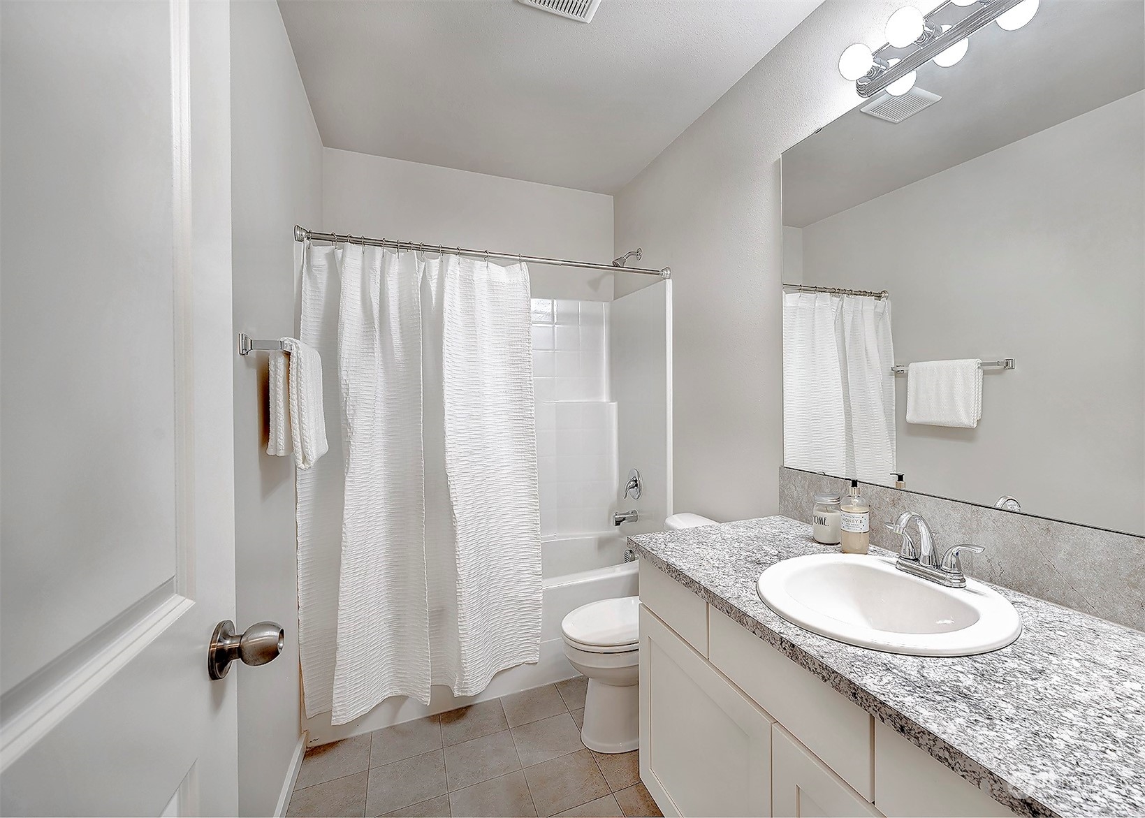 12329 23rd Drive Southeast, Unit 10 Everett, WA 98208 - Photo 19 of 24 a bathroom with a granite countertop sink toilet and shower