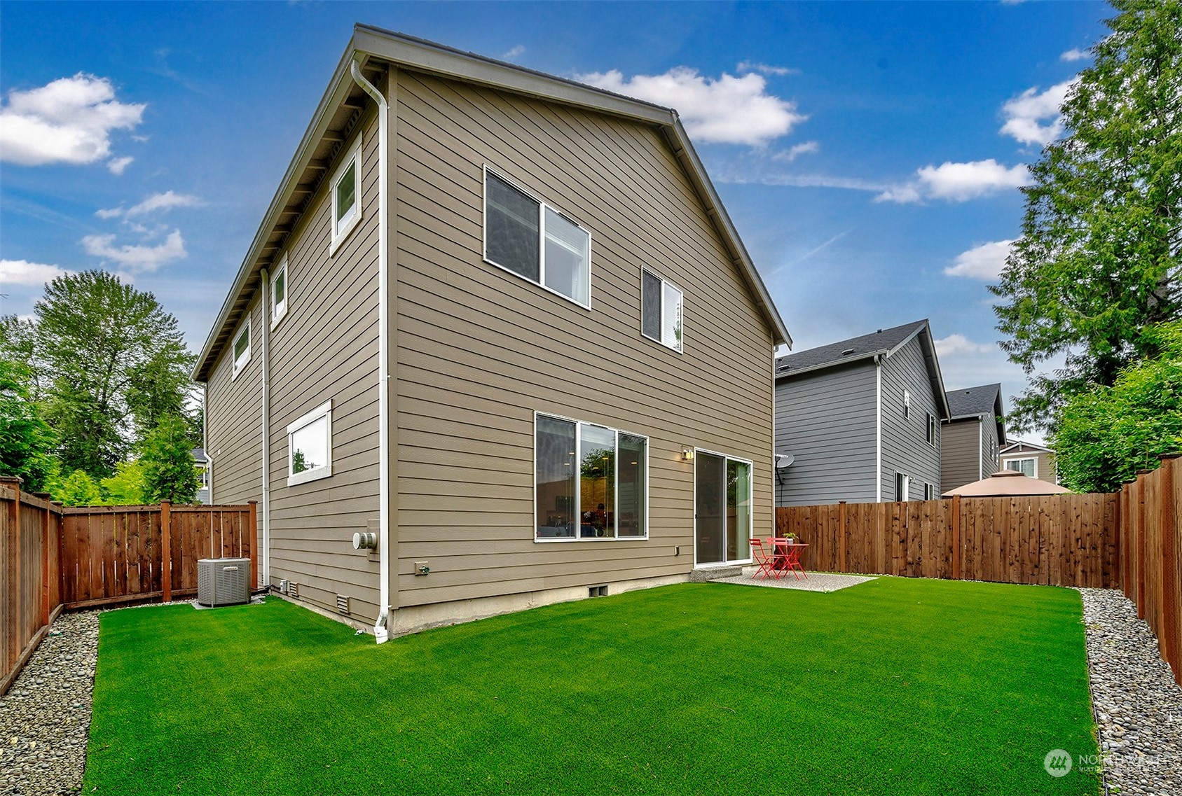12329 23rd Drive Southeast, Unit 10 Everett, WA 98208 - Photo 23 of 24 a view of backyard with a garden and deck