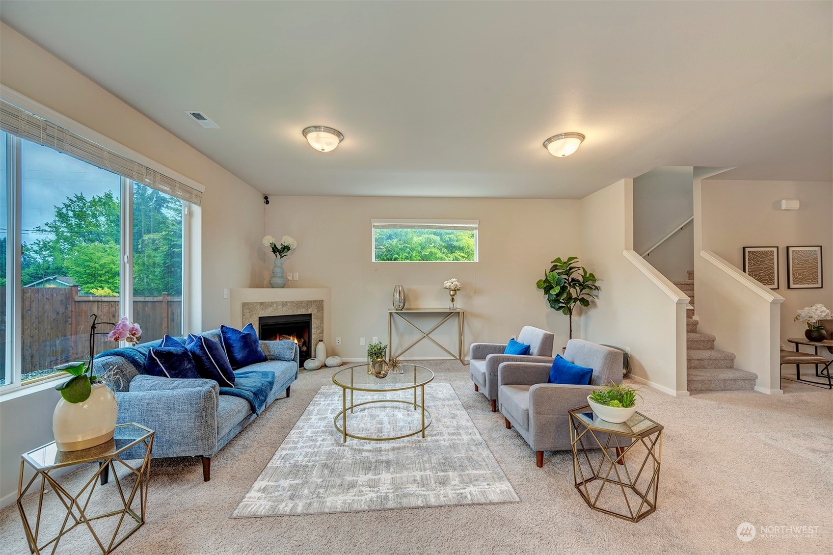 12329 23rd Drive Southeast, Unit 10 Everett, WA 98208 - Photo 4 of 24 a living room with furniture potted plant and a large window