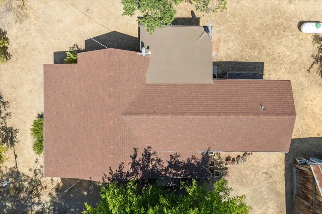 an aerial view of a city with mountains