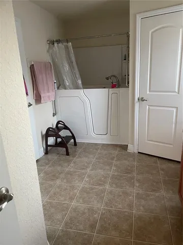 a room with furniture and a wooden floor