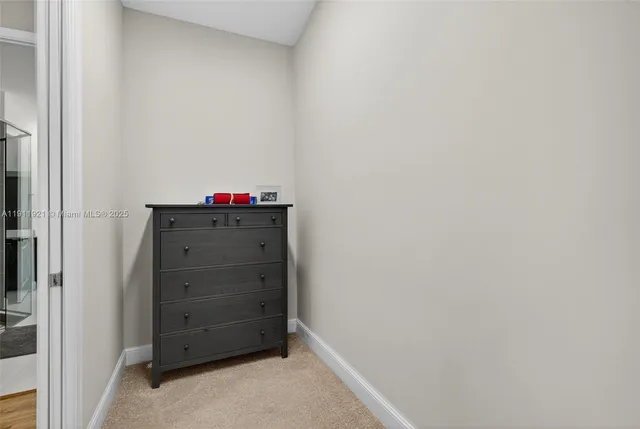 a room with furniture and a flat screen tv