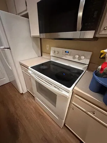 a utility room with washer and dryer