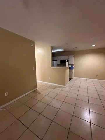 a view of a kitchen with a sink