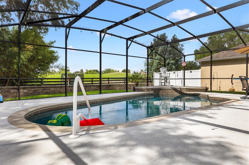 7351 Southeast 169th Cote Loop The Villages, FL 32162 - Photo 21 of 32 a view of yard with a patio