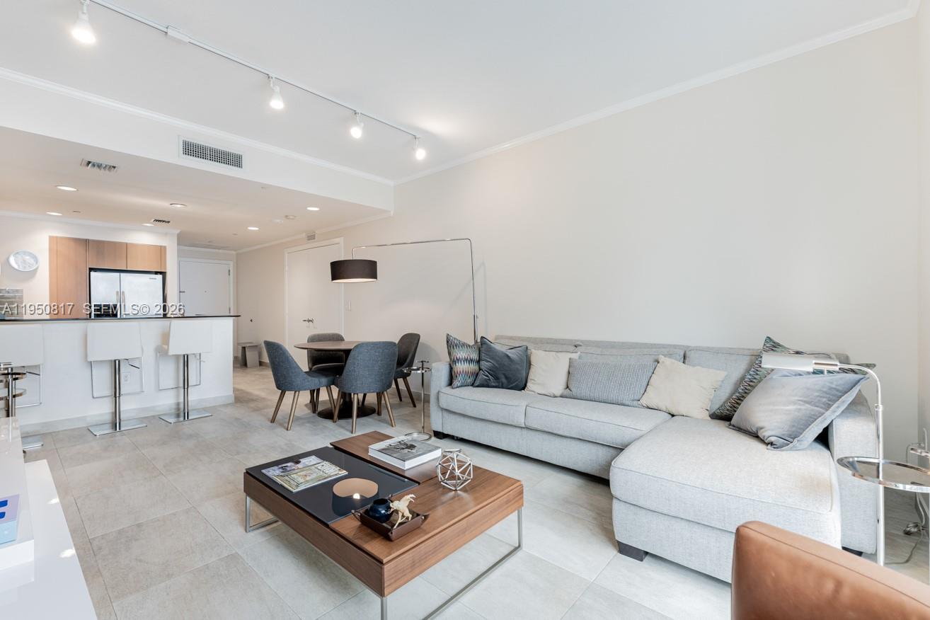1060 Brickell Avenue, Unit 1507 Miami, FL 33131 - Photo 2 of 56 a living room with furniture