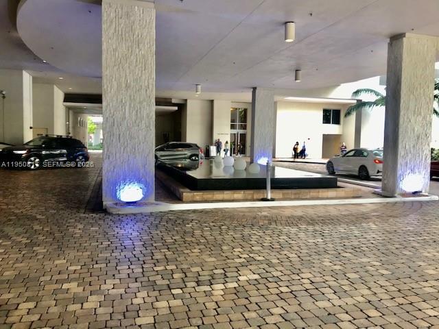 1060 Brickell Avenue, Unit 1507 Miami, FL 33131 - Photo 32 of 56 a view of a livingroom with furniture and floor to ceiling window