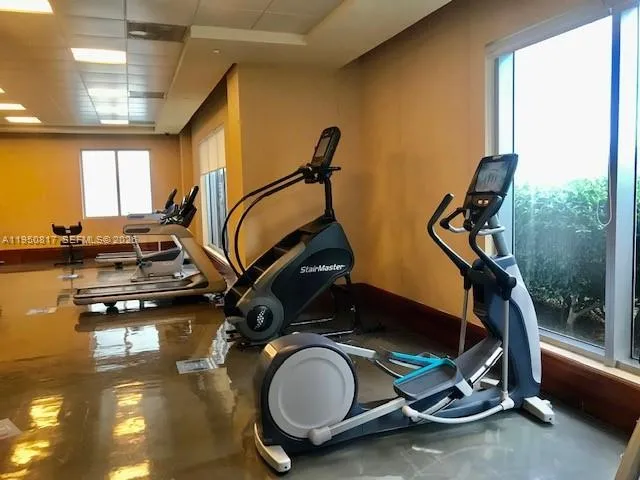 a view of a room with gym equipment
