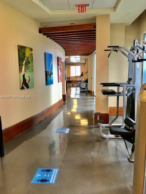 1060 Brickell Avenue, Unit 1507 Miami, FL 33131 - Photo 37 of 56 a view of a room with gym equipment