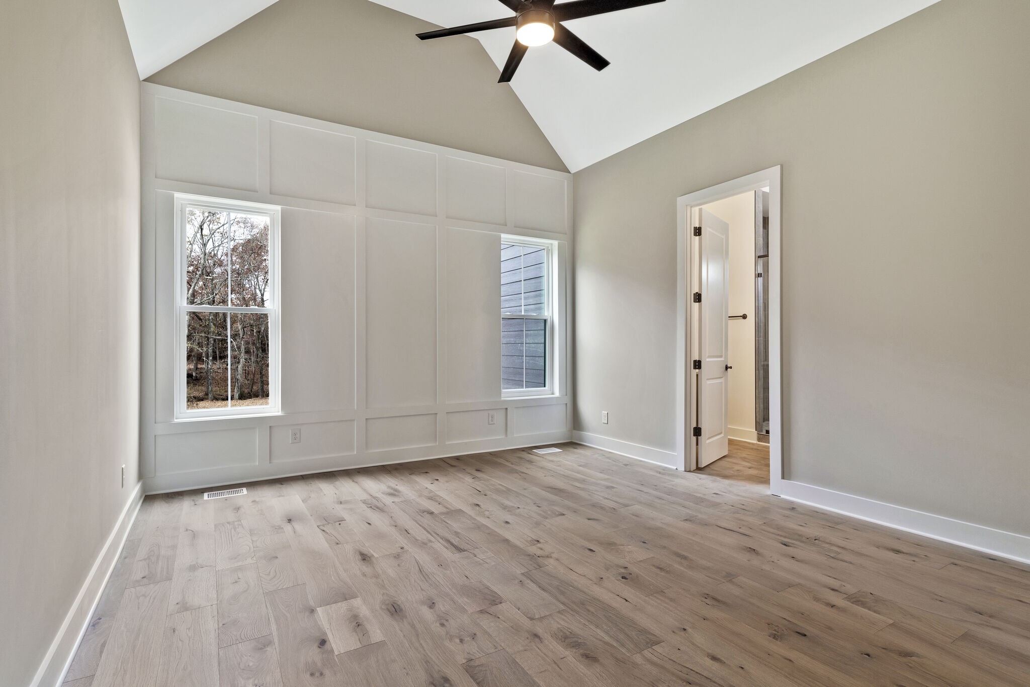 3435 Highway 25 Cottontown, TN 37048 - Photo 20 of 52 a view of an empty room with wooden floor and a window