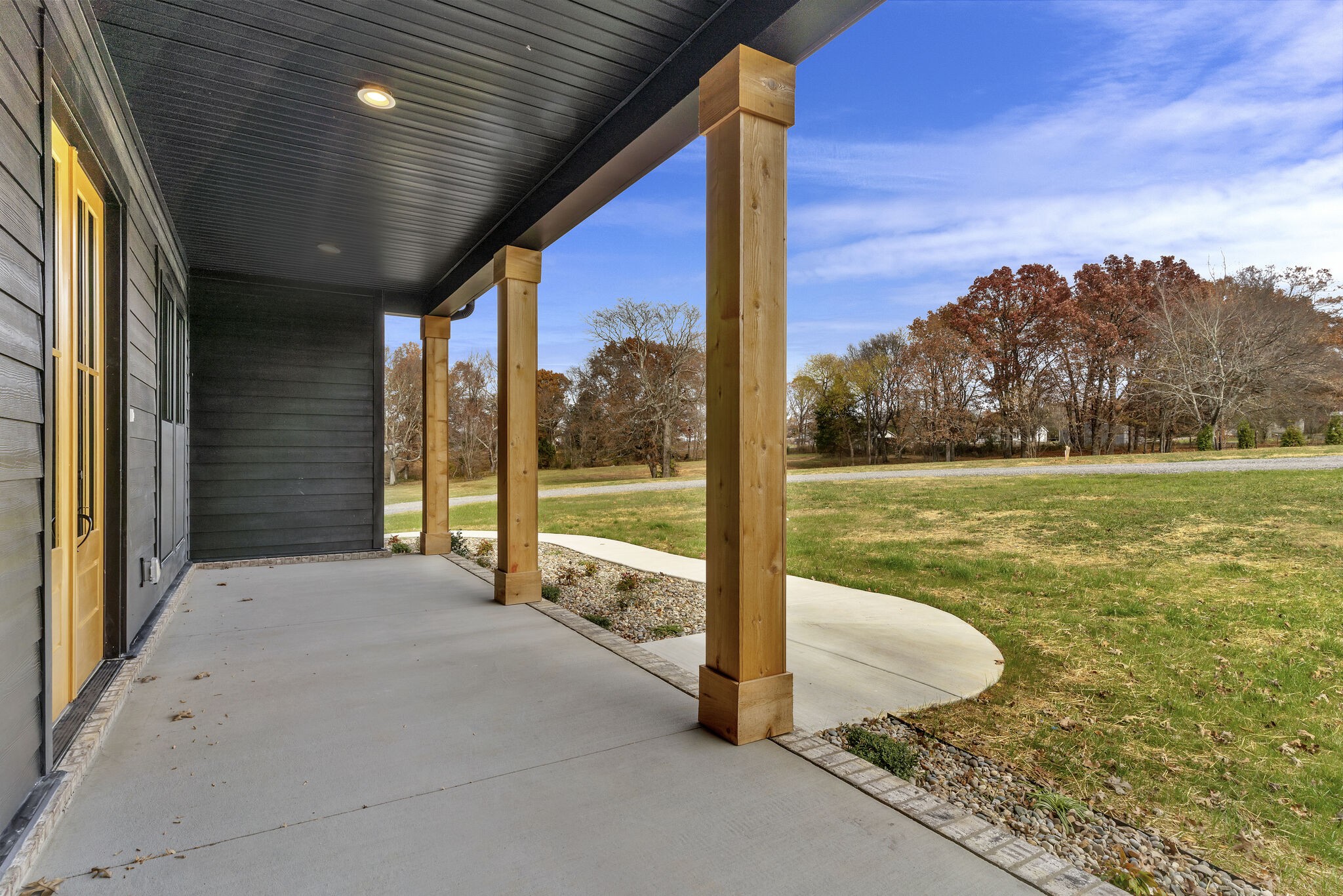 3435 Highway 25 Cottontown, TN 37048 - Photo 4 of 52 a view of a swimming pool with an outdoor space and seating area