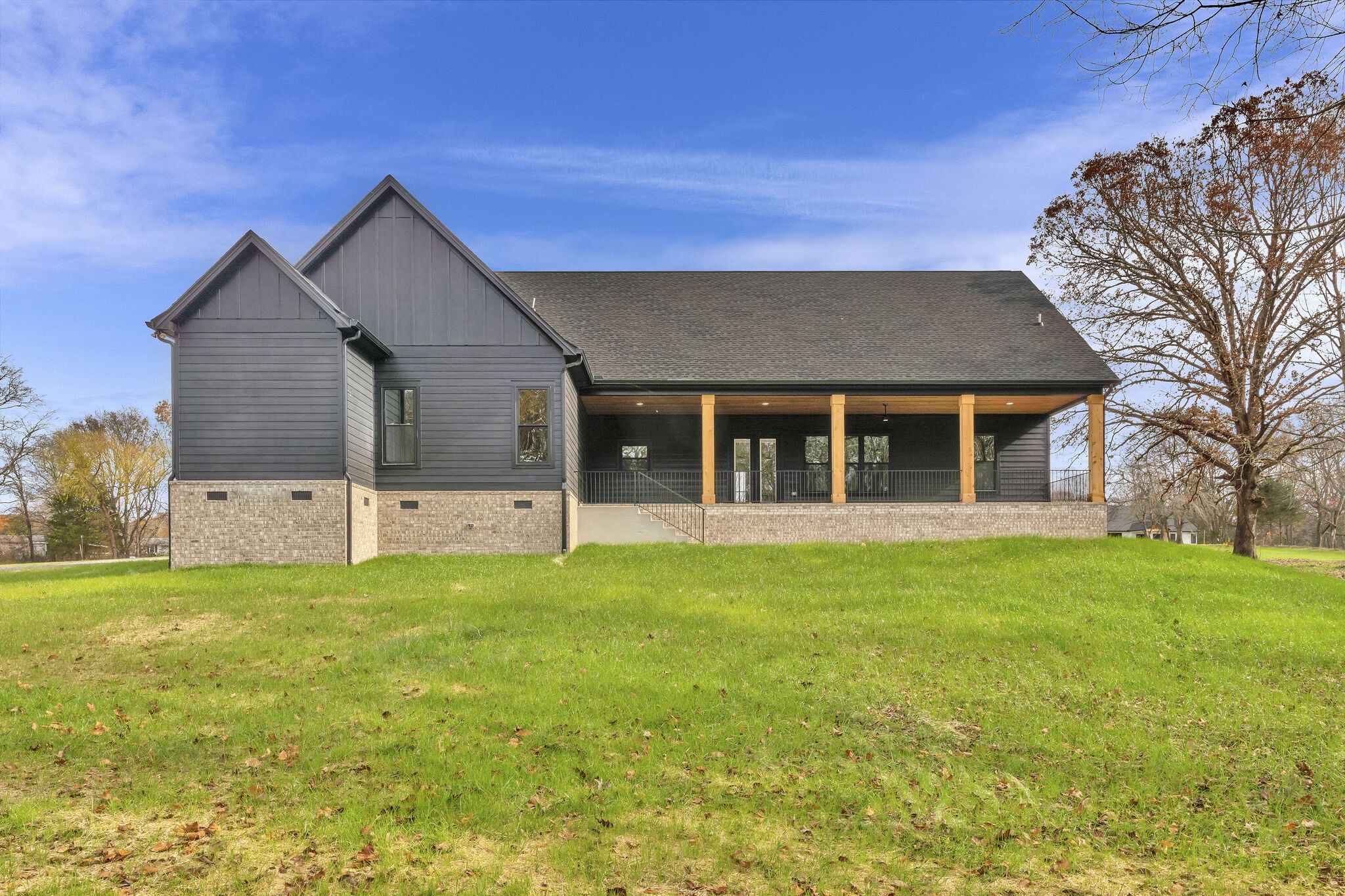 3435 Highway 25 Cottontown, TN 37048 - Photo 50 of 52 a view of a house with a yard