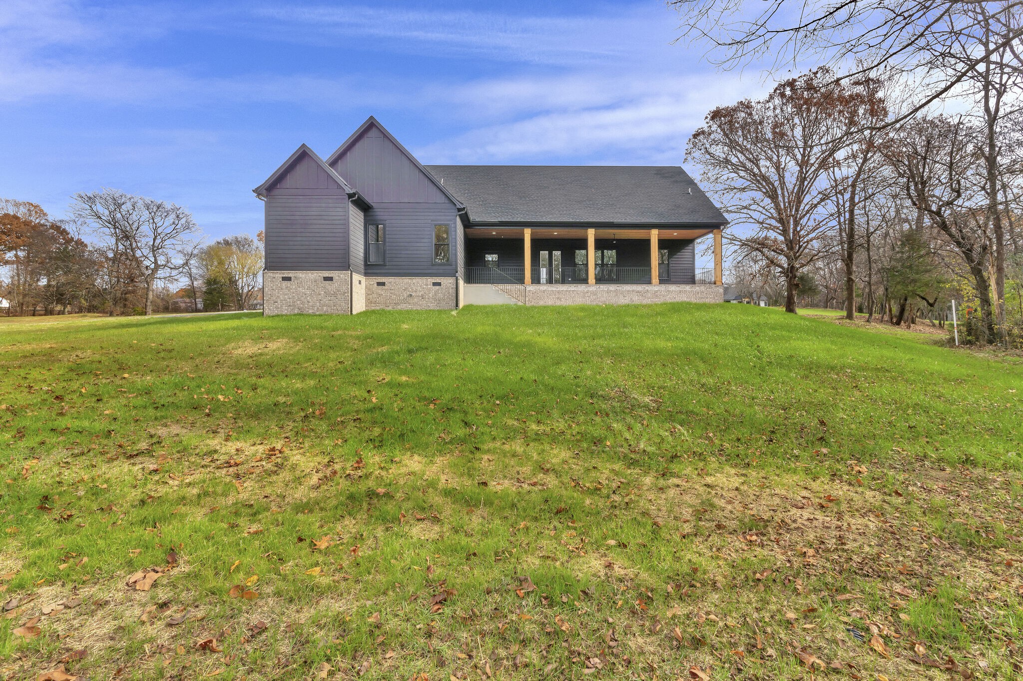 3435 Highway 25 Cottontown, TN 37048 - Photo 51 of 52 a front view of a house with a garden