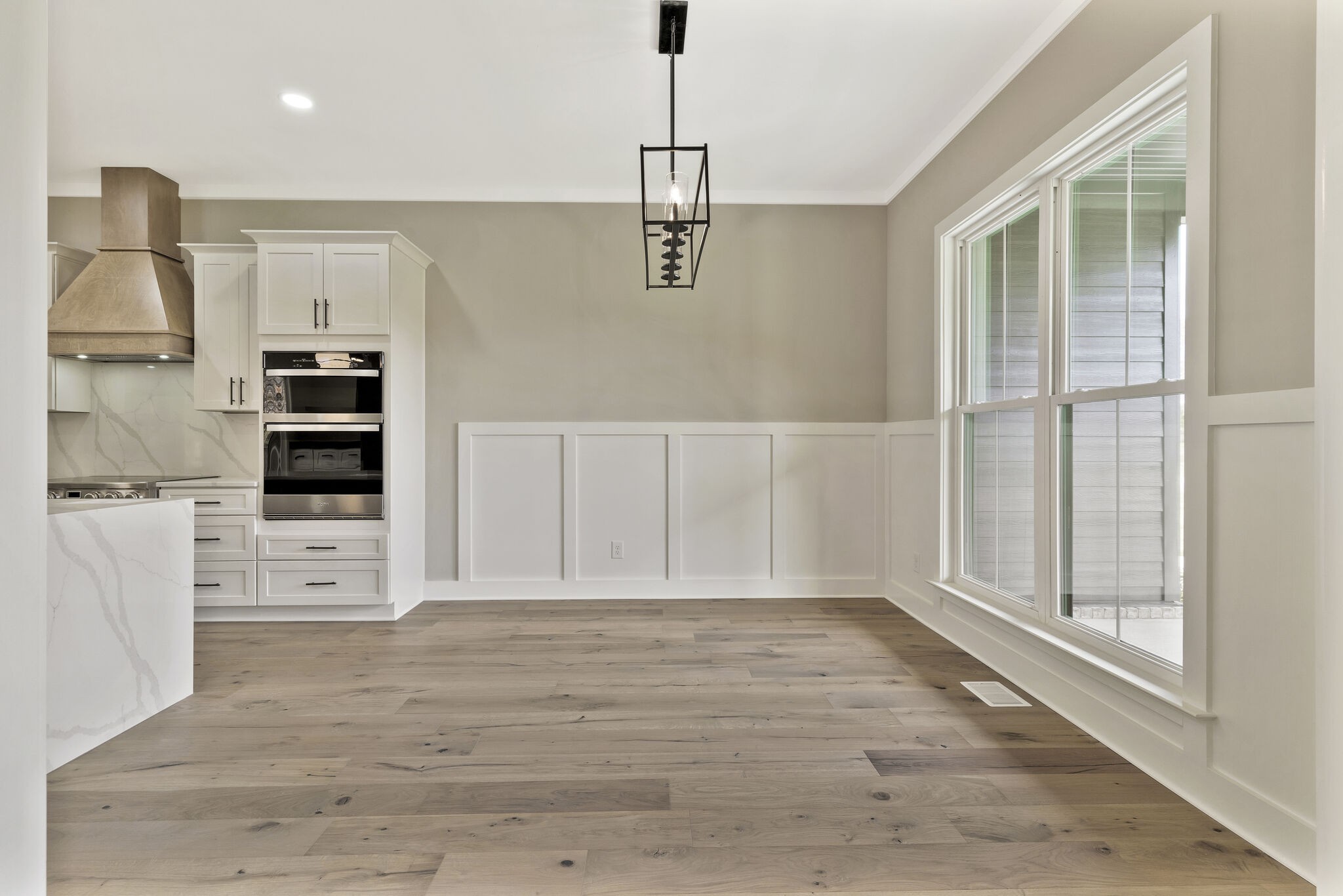 3435 Highway 25 Cottontown, TN 37048 - Photo 8 of 52 an empty room with furniture and wooden floor